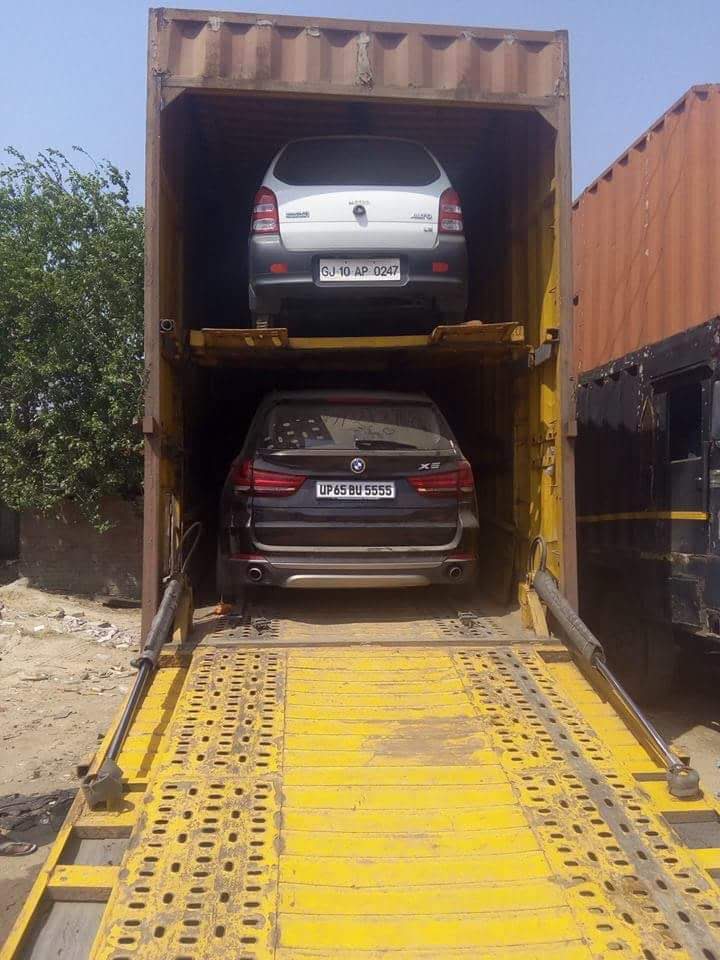 Movers loading heavy items